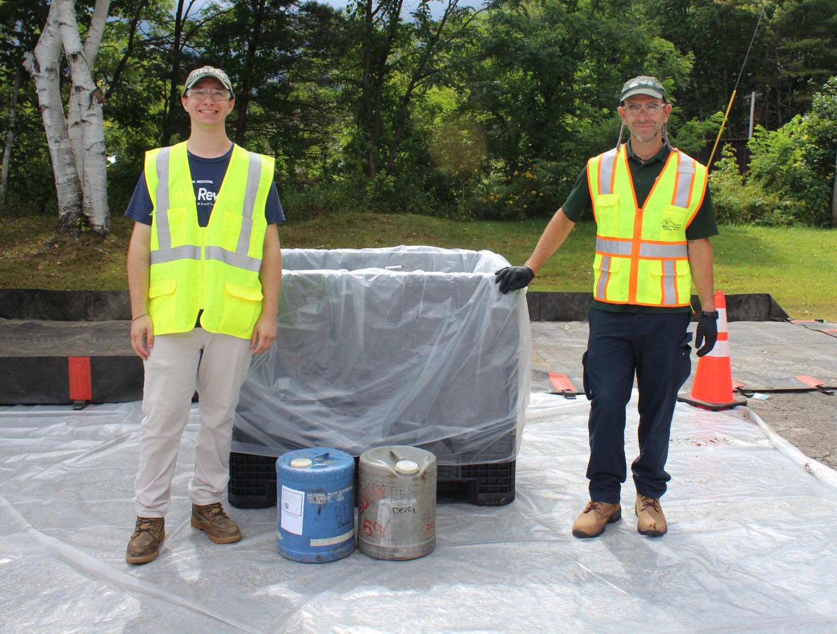 Gabriel Hemp of Revive Environmental (left) and Andy Gould of the N.H. Department of Environmental Services