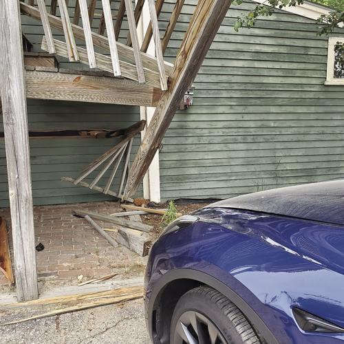 Tesla into J-Town Deli 1