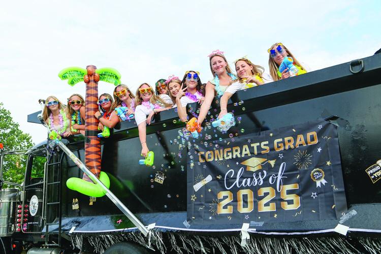 06-13-25 KHS Senior Parade dump truck smiles