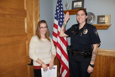 Gorham police officer Emelia Campbell swearing in by Town Clerk Christina Zornio