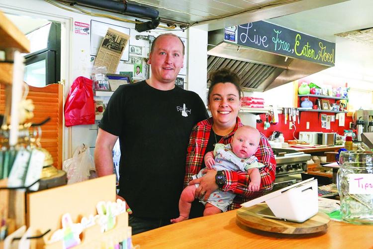 04-09-26 Eaton Village Store pose counter