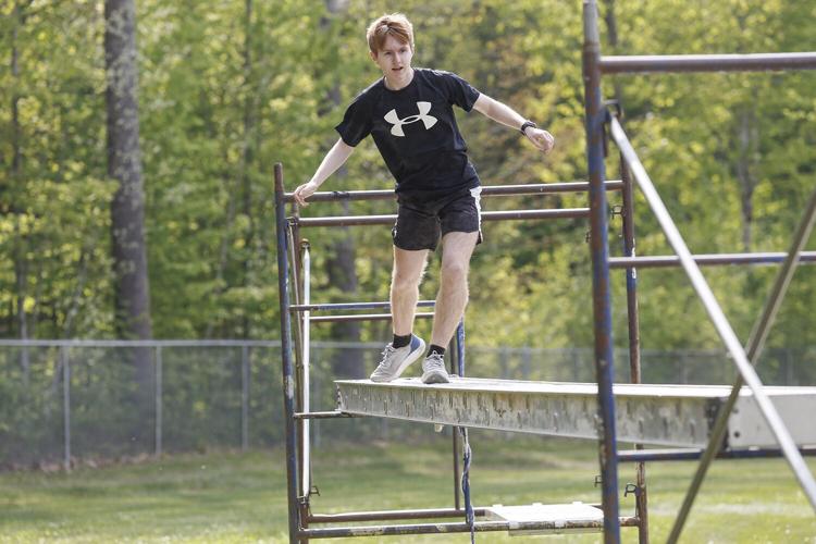 05-23-23 KHS Track Obstacle balancing on scaffolding semi-wide