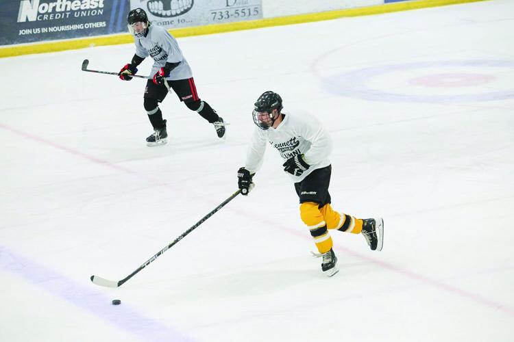 11-29-25 Kennett Hockey Alum carrying medium