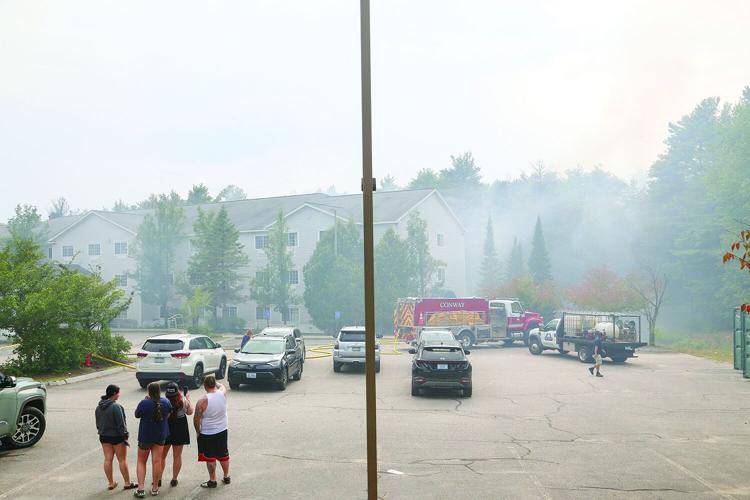 08-13-25 Holiday Inn-Brush Fire smoke from parking lot wide