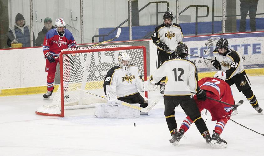 12-11-24 KHS Hockey laughland deflecting