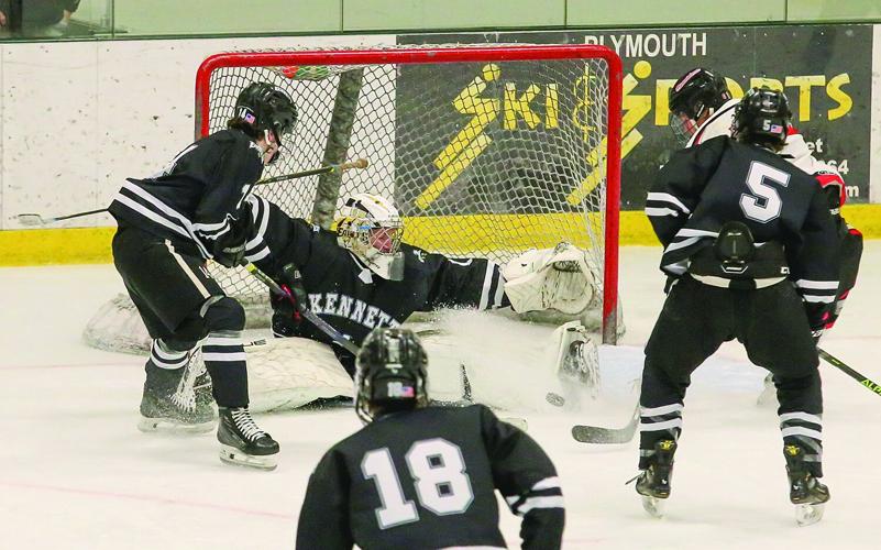 03-11-26 KHS-BG Frozen Four laughland pad save 1