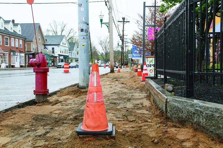05-06-25 Sidewalk Construction low near cone