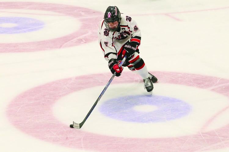 03-11-26 KHS-BG Frozen Four boucher carrying