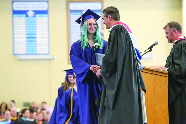 05-24-25 FA Graduation shaking hands medium