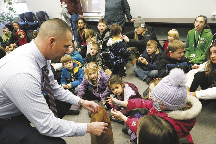 12-21-22 Gingerbread Hunt pd collecting evidence
