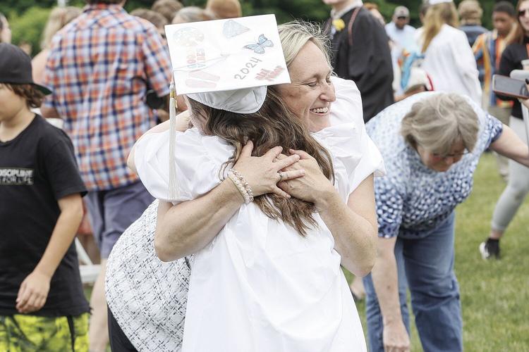 06-08-24 KHS Grad hug fougere yahna