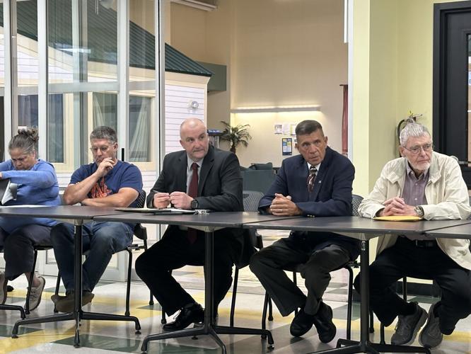 Community members attending the Aug. 20 roundtable discussion on reducing fatal domestic abuse cases