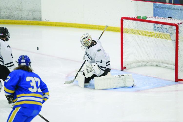 12-27-25 KHS-Maine Hockey laughland deflect