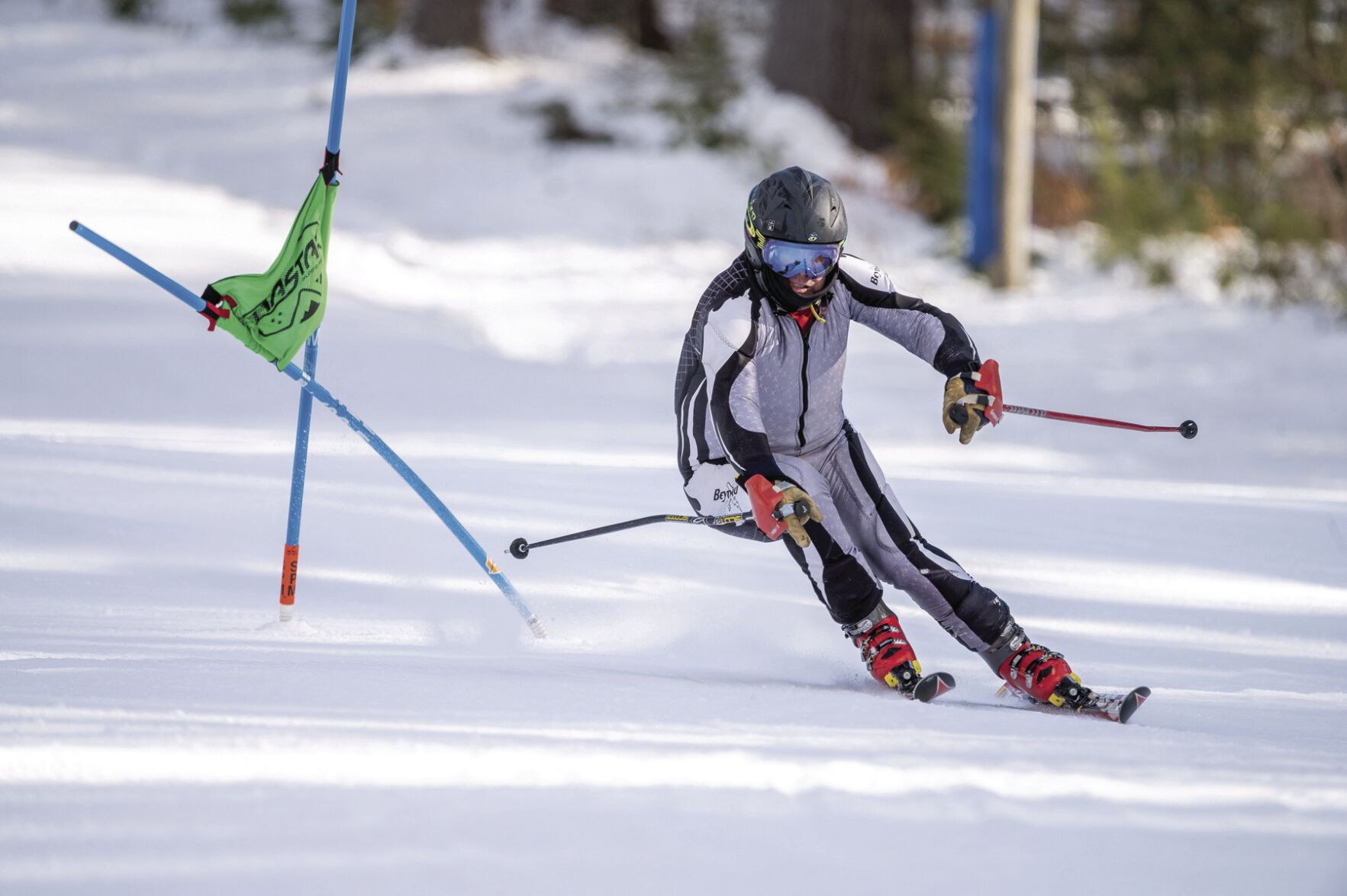 Mountain Meister - Doug MacDonald goes past a gate