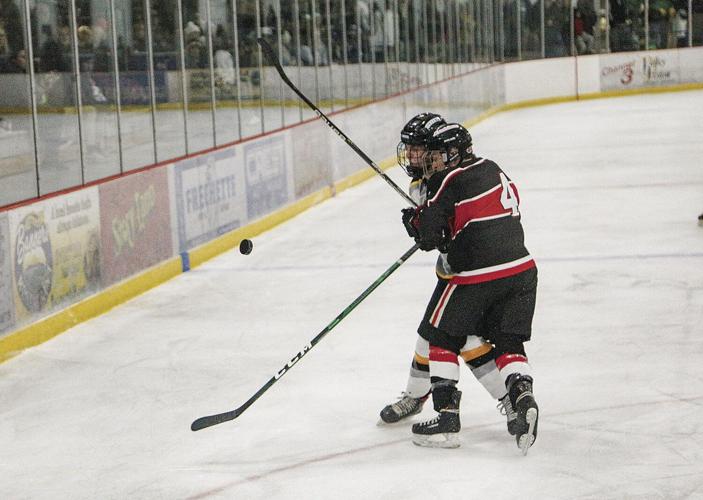 12-14-22 KHS-Berlin Hockey croteau-murphy colliding by puck 1