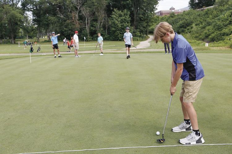 07-14-22 Junior Golf practicing putt wider