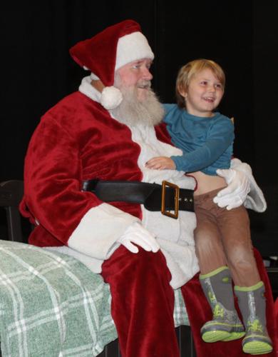Calvin Daisey visits with Santa Claus