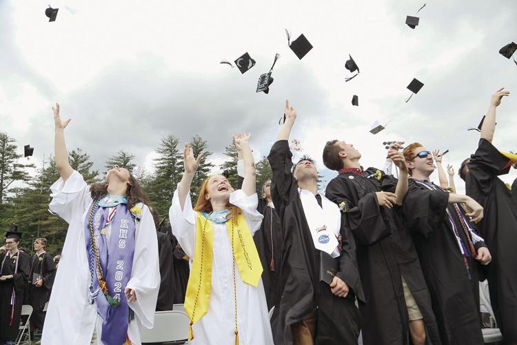 06-08-24 KHS Grad tossing caps 1