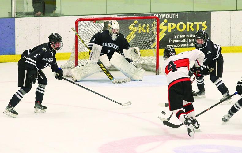 03-11-26 KHS-BG Frozen Four laughland bledsoe shot