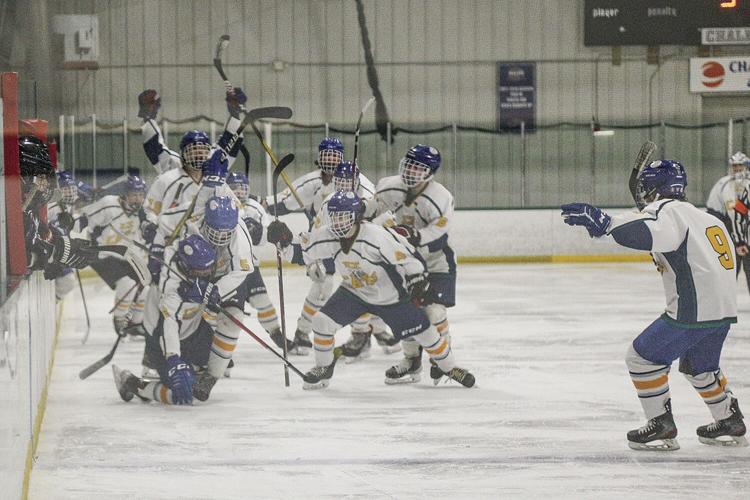 03-02-22 Ice Cats celebration hug