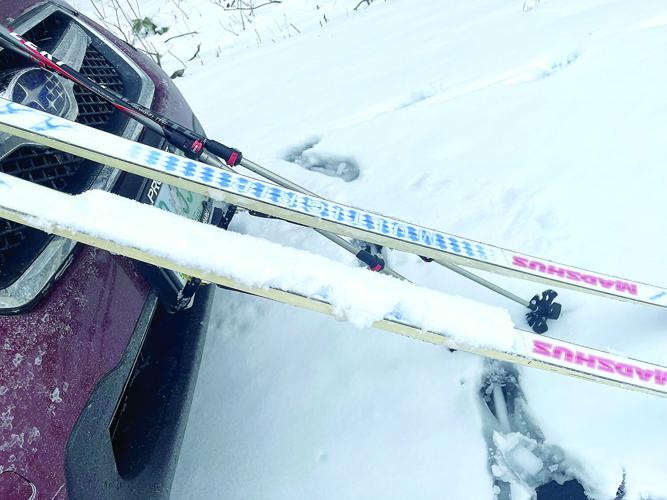 Nordic Tracks - still skiing - clumps of snow on skis