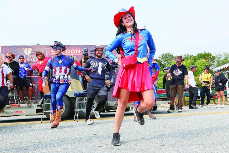 09-06-25 Mud Bowl Parade heroes dancing