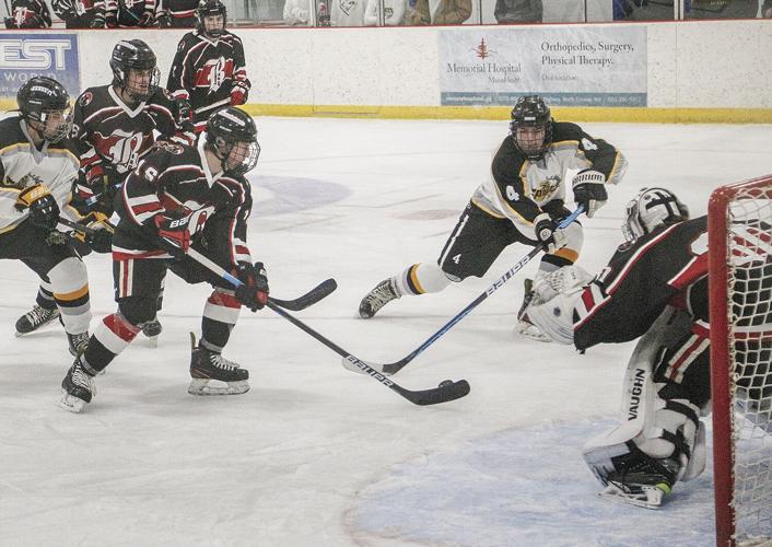 12-14-22 KHS-Berlin Hockey crowded by goal