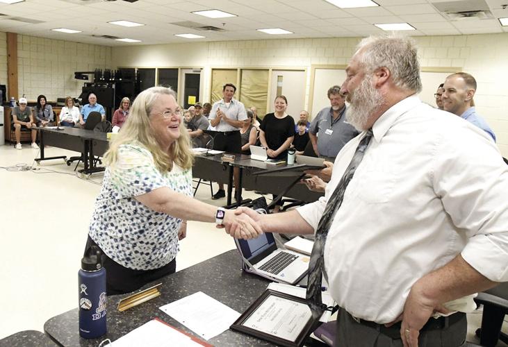 Conway School Board - retitrees - Therese Davison with Kevin Richard