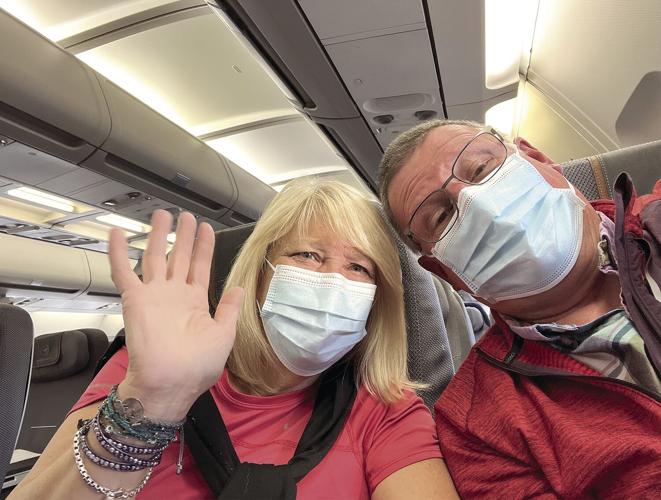 Love in the Sun - Nancy and Rob Clark on plane to Portugal