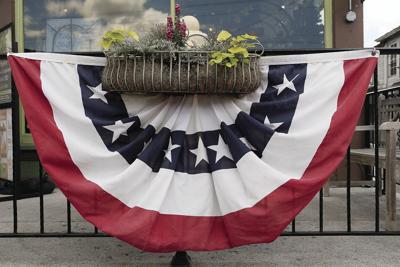 06-30-21 Fourth Decor flag on fence tight