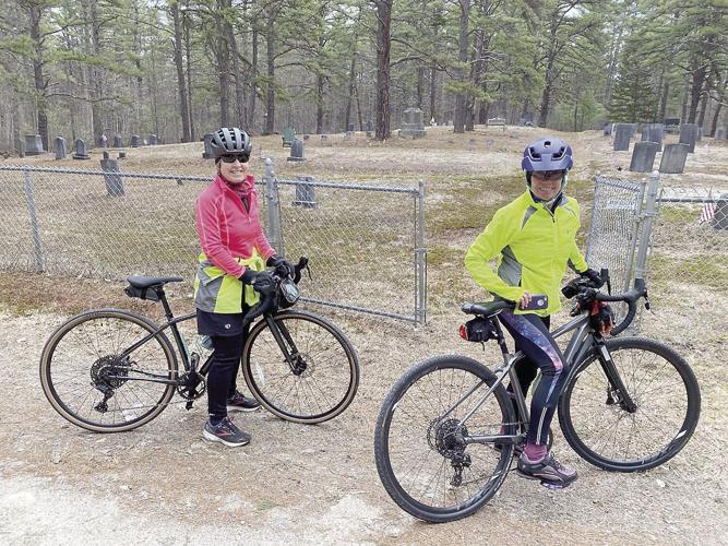 Wheel Family Fun - Susie Lathrop and Sally McMurdo check out the Marston Cemetery
