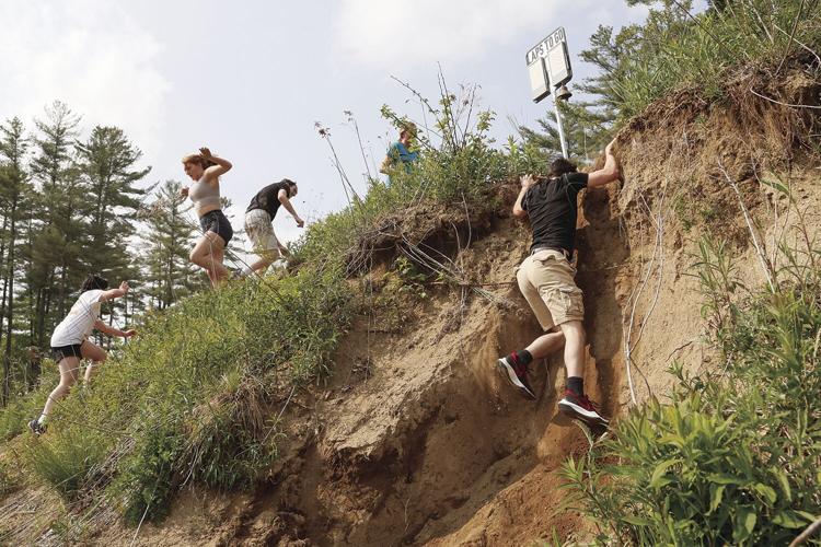 05-23-23 KHS Track Obstacle jumping up hill more people