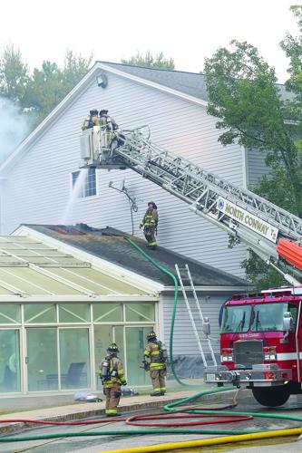 08-13-25 Holiday Inn-Brush Fire hosing vertical wide