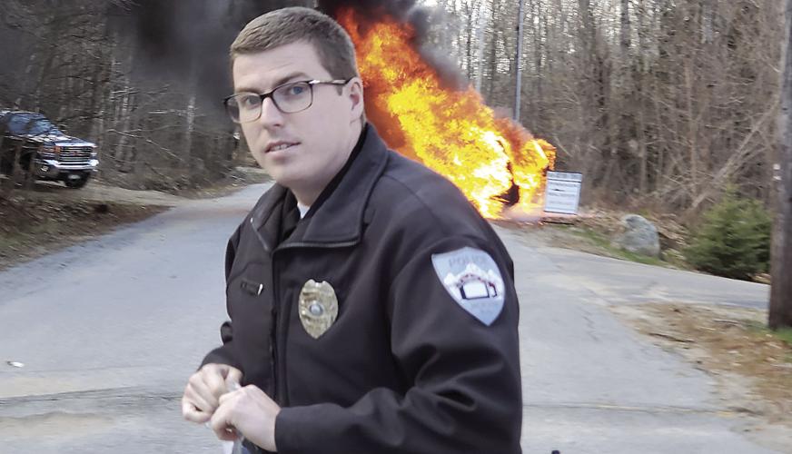 Officer Marty Bourque at car fire