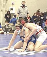 Job Fox wins Class B wrestling title at 195 pounds