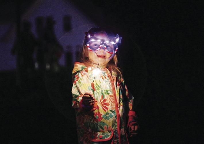 07-02-21 Jackson Fireworks kid with sparkler smiling
