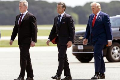 Army Secretary Dan Driscoll, Secretary of Defense Pete Hegseth and President Donald Trump attend a dignified transfer on July 22, 2026, for casualties of the Iran war.