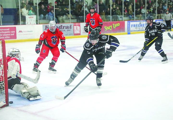 03-28-26 Battle Badges Hockey post shot