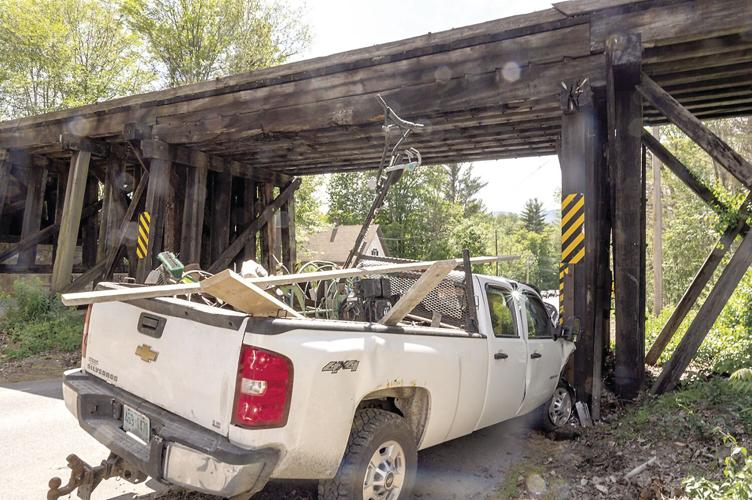 Pickup hits train trestle 1