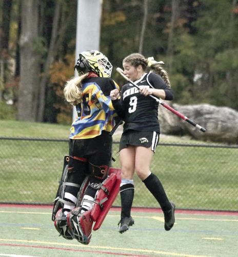 KHS field hockey - Madison Walcott and Nora Goodman celebrate