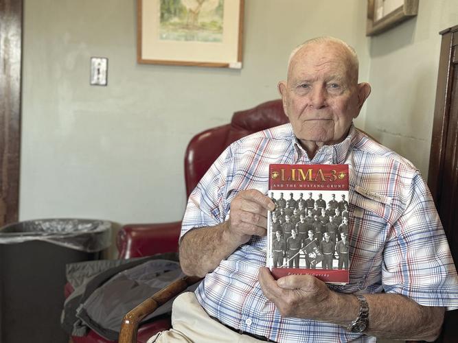 mccarthy portrait holding book