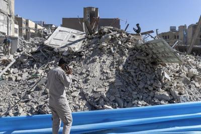 Rubble from a police station damaged in airstrikes on March 3, 2026 in Tehran, Iran.