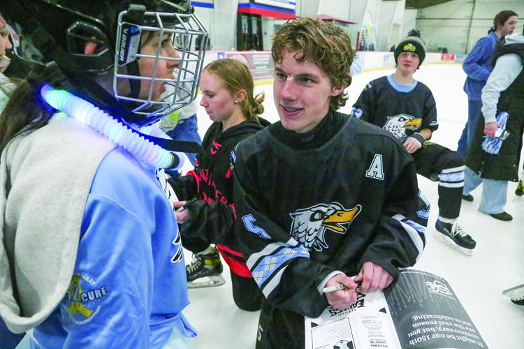02-14-26 KHS Hockey Fights Cancer skate chatting zipf