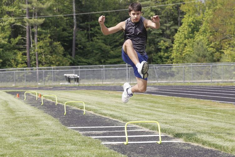 05-23-23 KHS Track Obstacle leaping hurdles