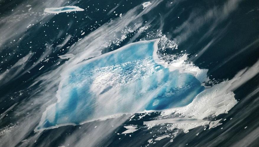 Iceberg once world’s biggest turns BLUE as it nears complete disintegration
