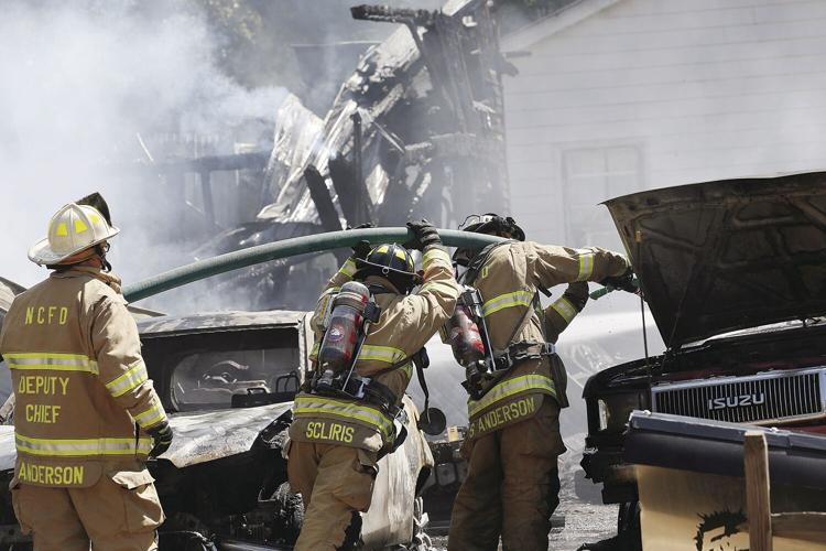 08-03-22 Greenwood Fire hosing car tightest