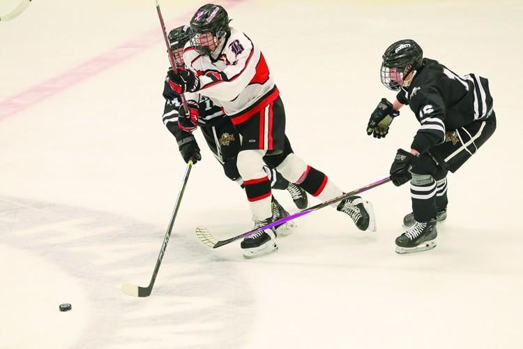 03-11-26 KHS-BG Frozen Four bledsoe surrounded