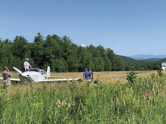 Plane in hayfield