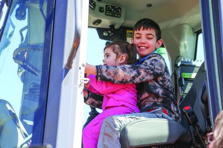 04-21-26 Touch-A-Truck siblings medium