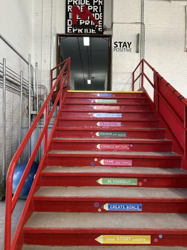 Steps of inspiration lead down to the floor of the Berlin Elementary School gym